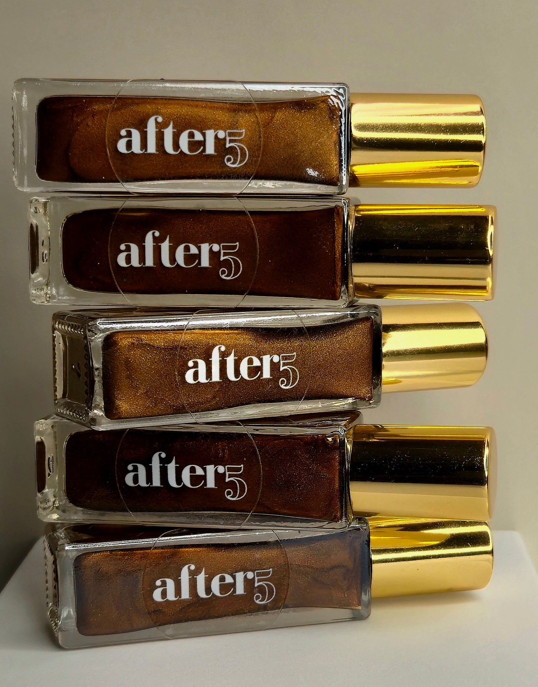 stacked oil free face highlighter rollerballs 