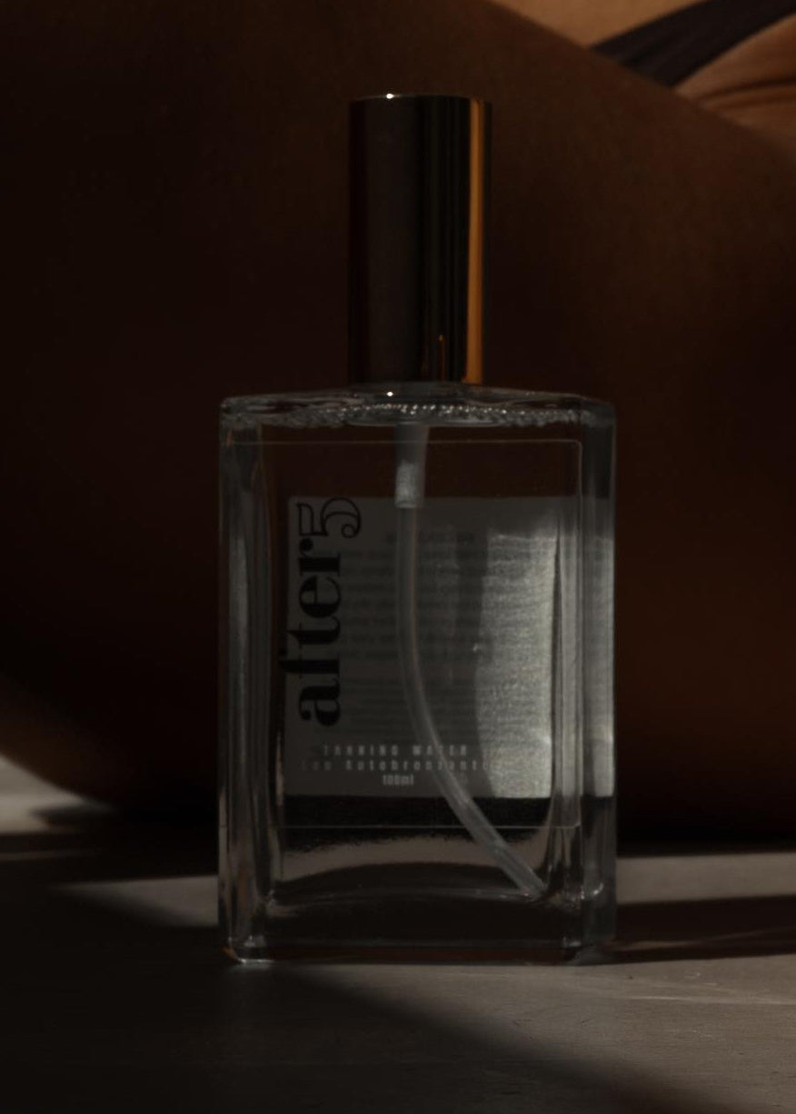 tanning water 100ml dark image 